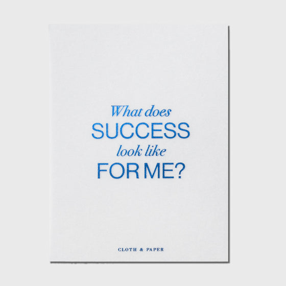 Success journaling card shown on a neutral background.