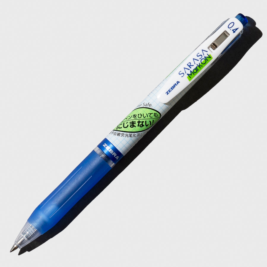 Pen in Blue turned to the right against a neutral background.