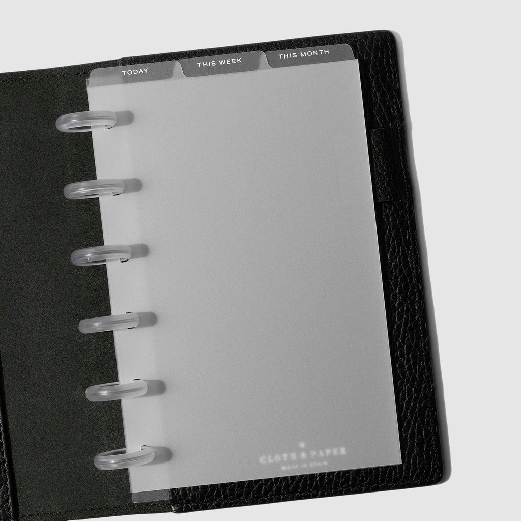 CP Petite White Foil Cadence Tab Dividers displayed in a black leather planner.