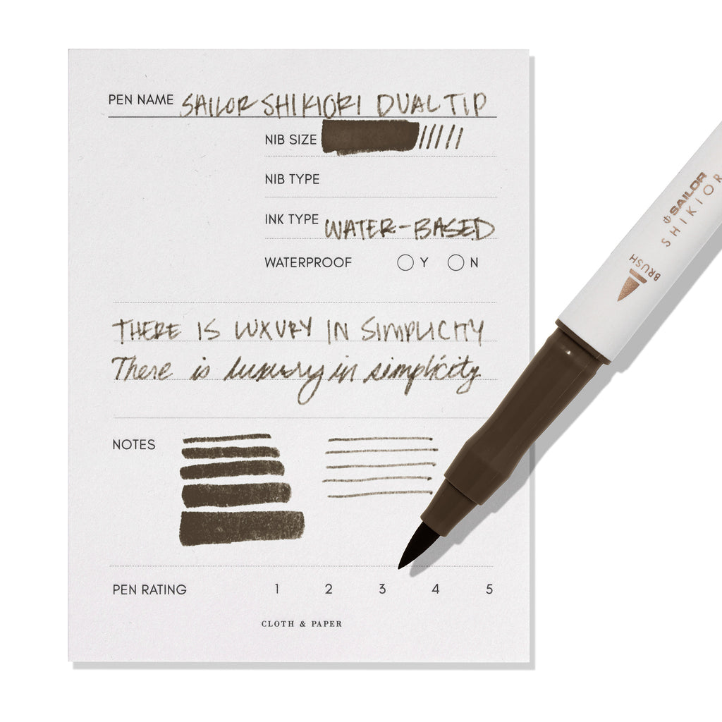 Pen displayed next to in use pen test sheet. Color pictured is Doyou. 