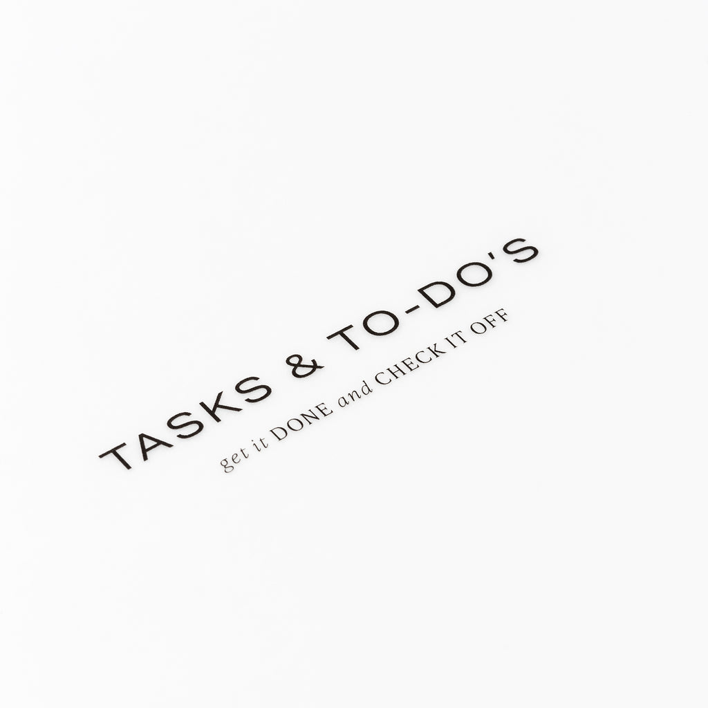 Closeup of text reading "tasks and to-do's | get it done and check it off"