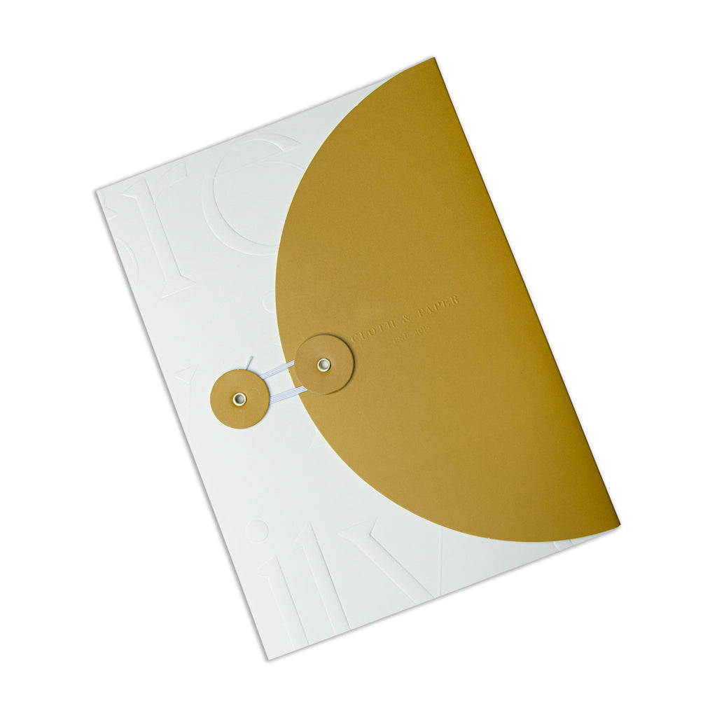 Arched Pocket Folder, Tuscany, Cloth and Paper. Folder tilted slightly to the left on a white background.