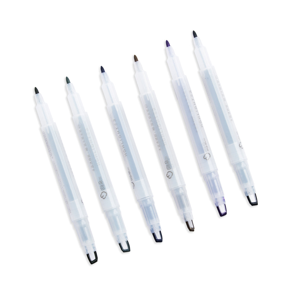 See-Through Dual Tip Highlighter, Set of 6, Cloth and Paper. Six highlighters posed parallel with nibs exposed, tilted slightly to the left on a white background.