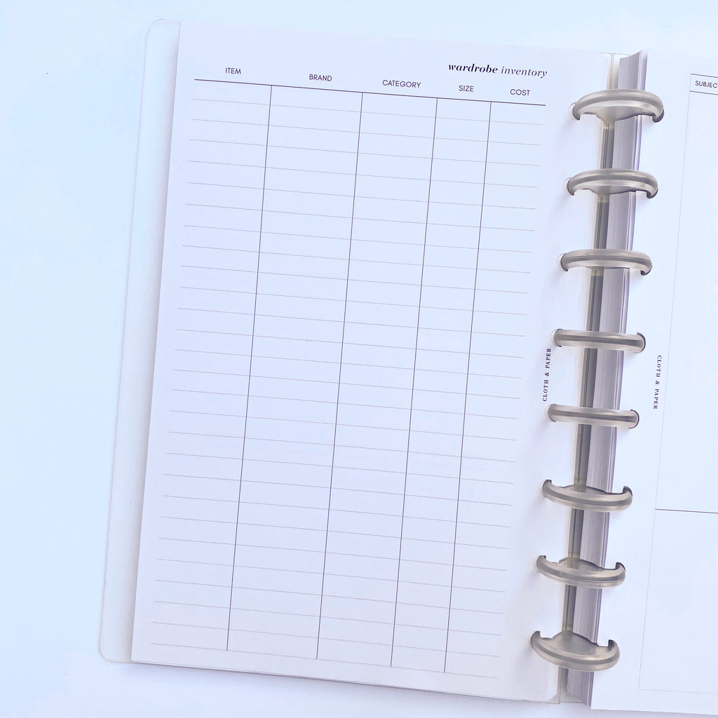 Capsule Wardrobe Inserts inside a discbound planner, with planner opened to display back of insert page.