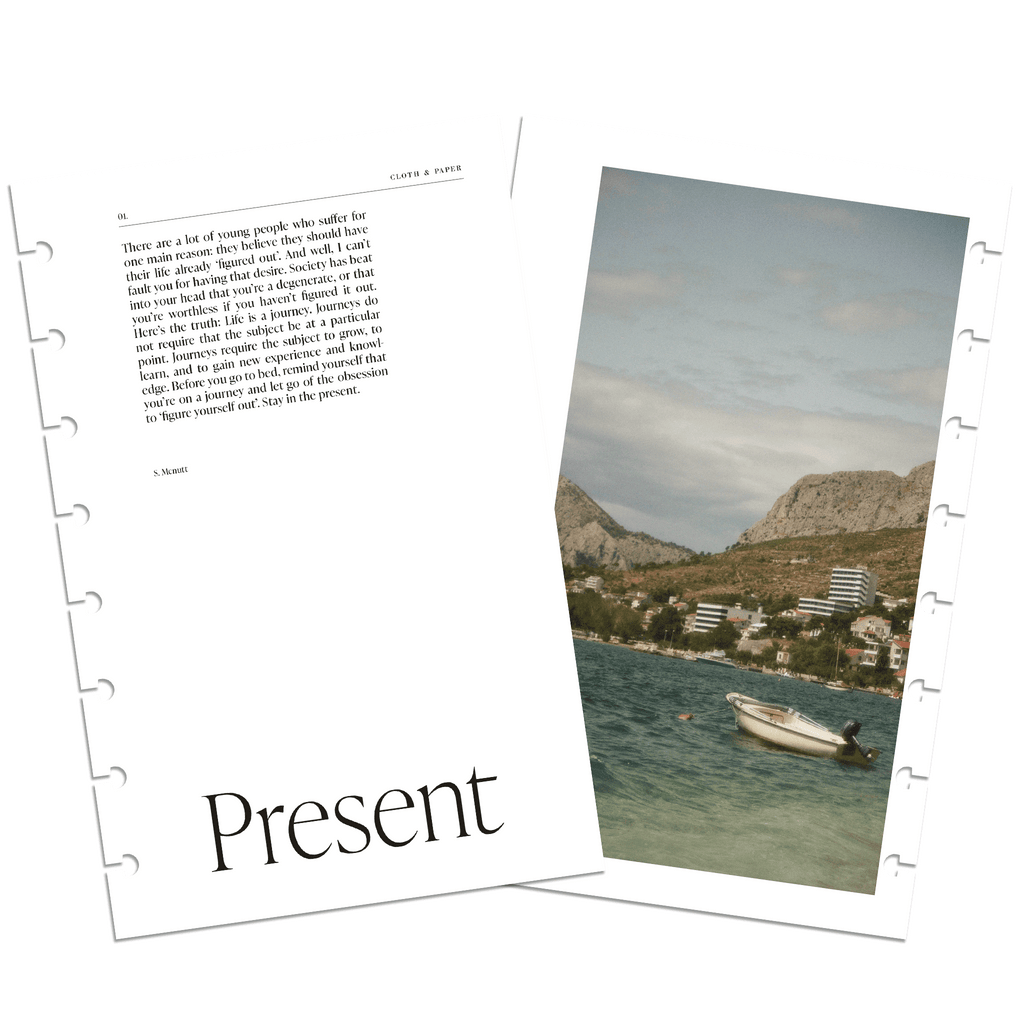 Mock-up of the Present Discbound Cover Planner Dashboard Duo. Both sides of the front dashboard are displayed, with the front side layered slightly over the backside. The front has an editorial style and the back has imagery of a boat off a coastline.