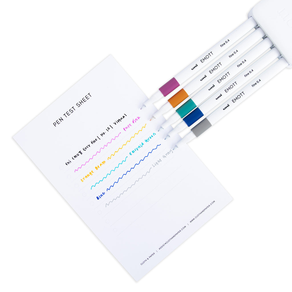 Five pens in the Virtual color collection resting on an in use pen test sheet.