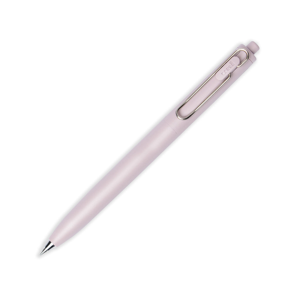 Pink pen turned to the right against a white background.