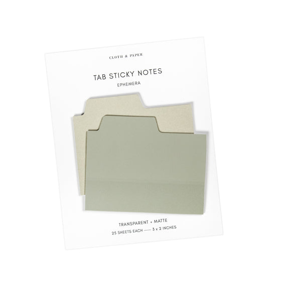 Blank Tab Sticky Note Set, Ephemera, Cloth and Paper. Sticky note set displayed against a white background. The matte sticky note pad is attached to the sticky note backing, while the transparent sticky note pad is layered on top of it, turned slightly to the right.