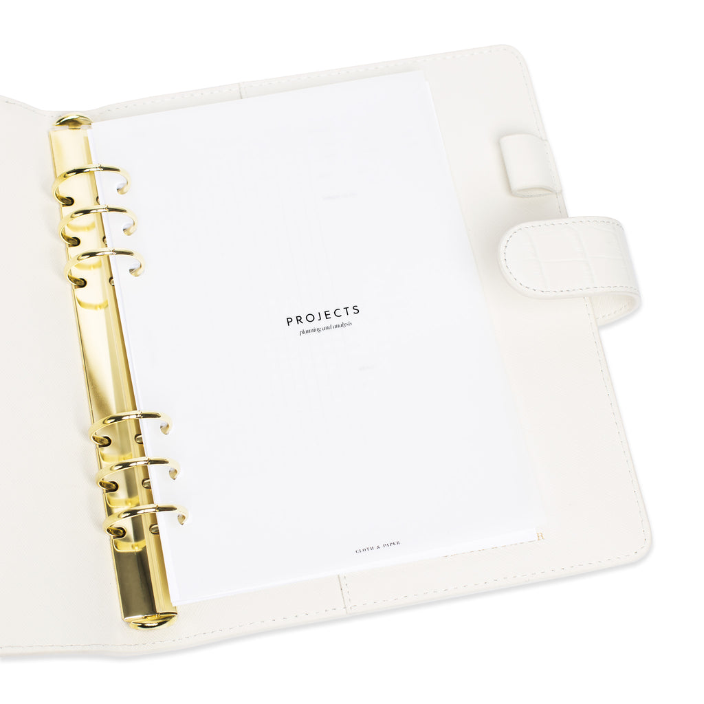 Projects Section Cover Planner Dashboard styled inside a white leather agenda.